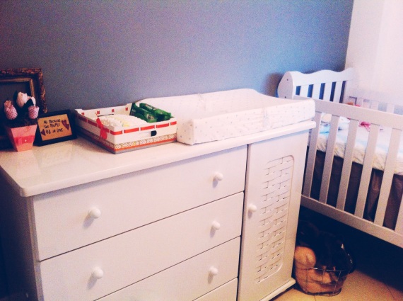 I Love her dresser. We've got a changing pad on top and a little 'diaper caddy' next to it with diapers and wipes and creams ready to be used! 